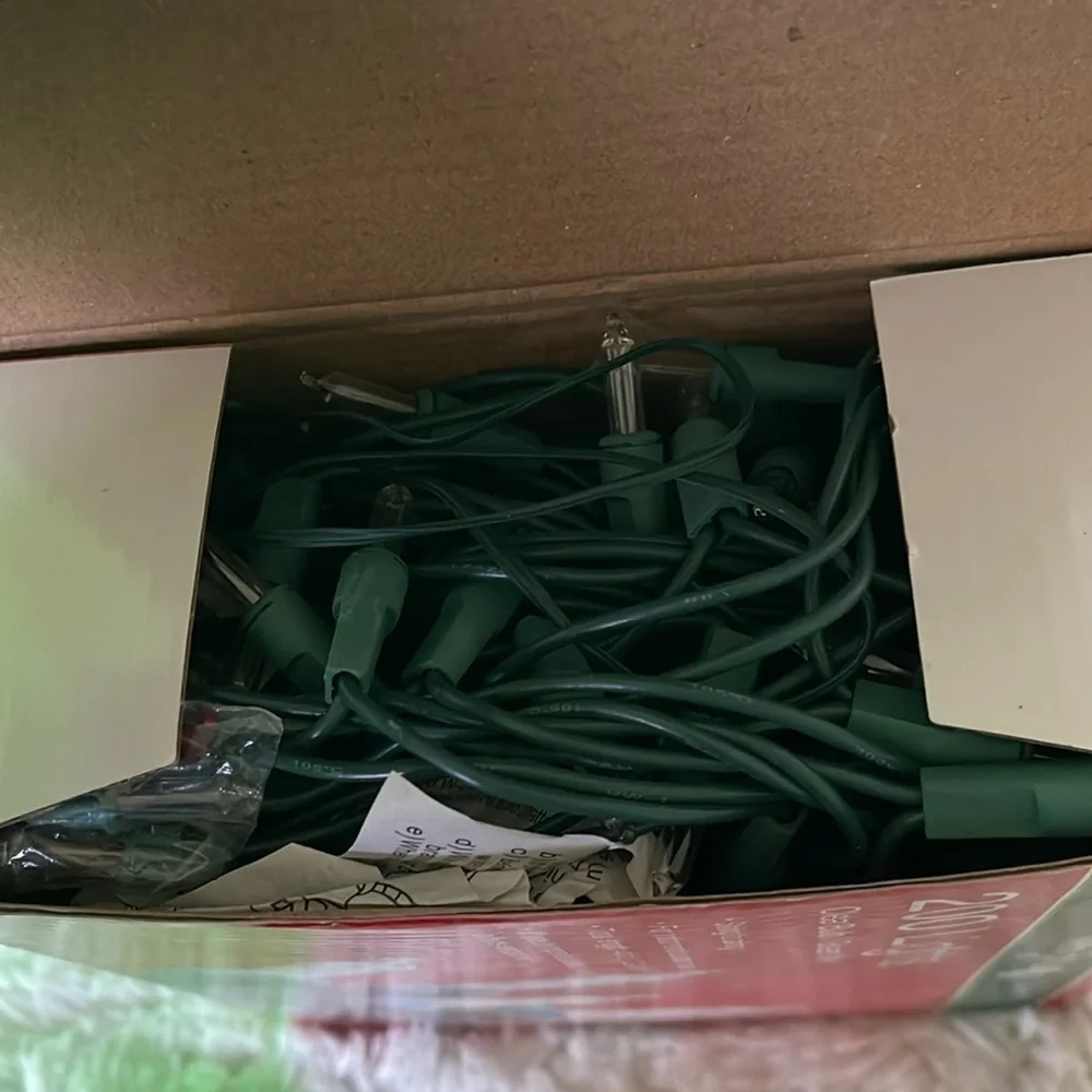 200 clear Xmas light on a string used once but never used ever again .